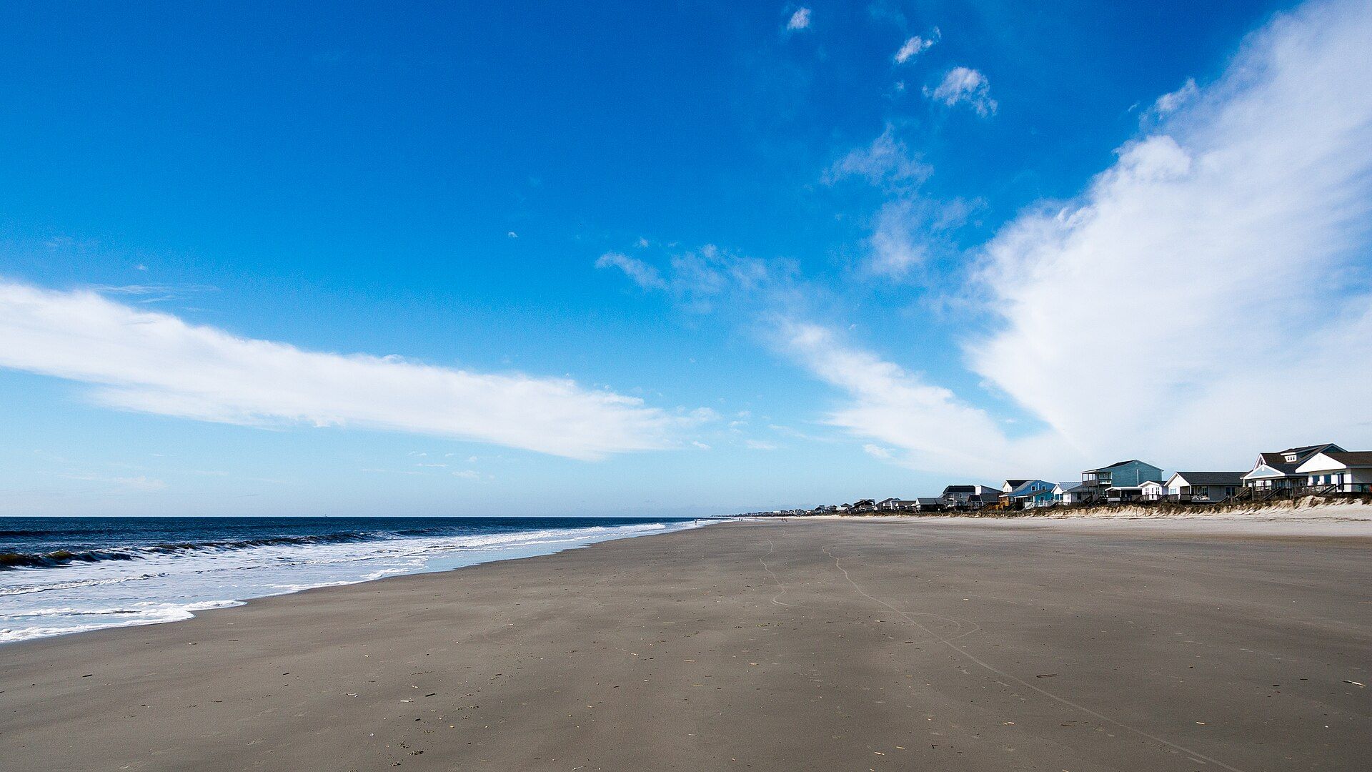 The Oak Island Pier reaching out over the ocean